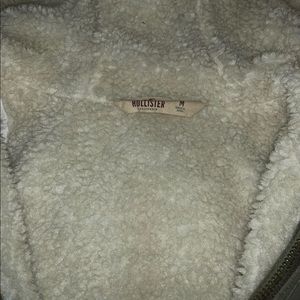 Long Hollister coat with fur on the inside.